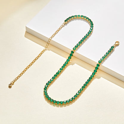 Detailed view of 14K Gold Diamond Tennis Necklace with Round Green CZ