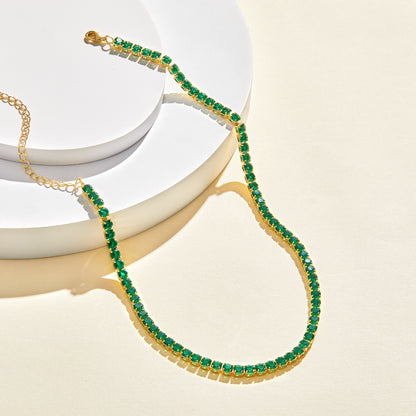 Detailed view of 14K Gold Diamond Tennis Necklace with Round Green CZ