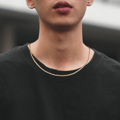 Close-up of 14K Gold Layered Necklaces - Snake, Rope, Paperclip Chain